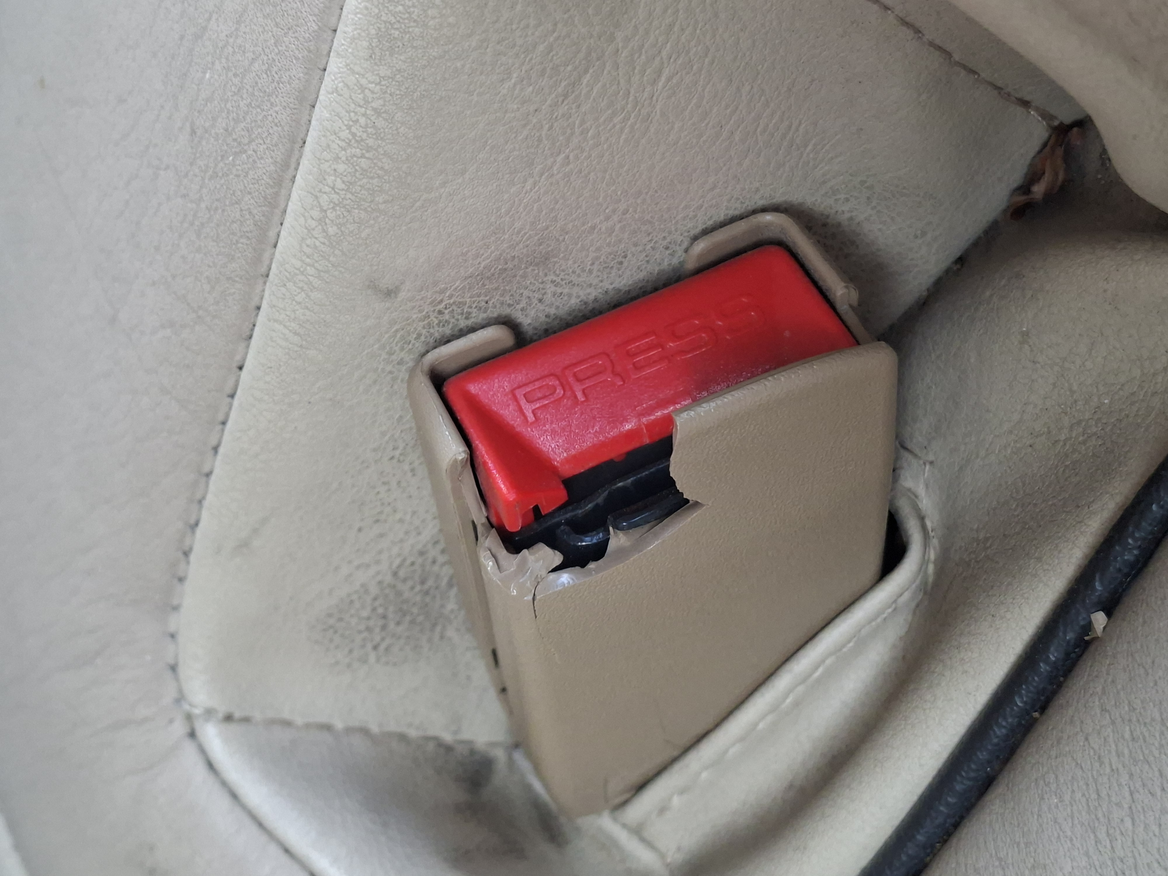 2025 12 Rover Cabrio Seat Belt Clip.jpg